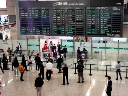 中国严防境外新冠疫情输入 大减联外航班数量
