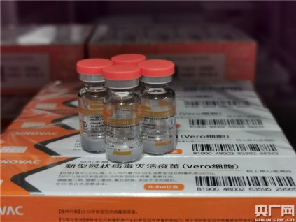 明报社评：中西方疫苗竞争 接种产能定输赢
