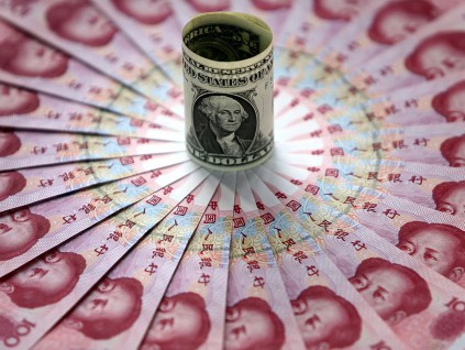 旺报社评：人民币与取代美元的距离 美狂印钞各国疑虑